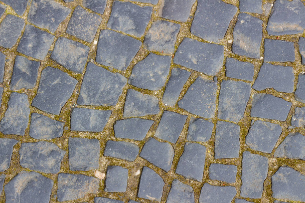 Texture of black granite paving tiles - Photo, Image