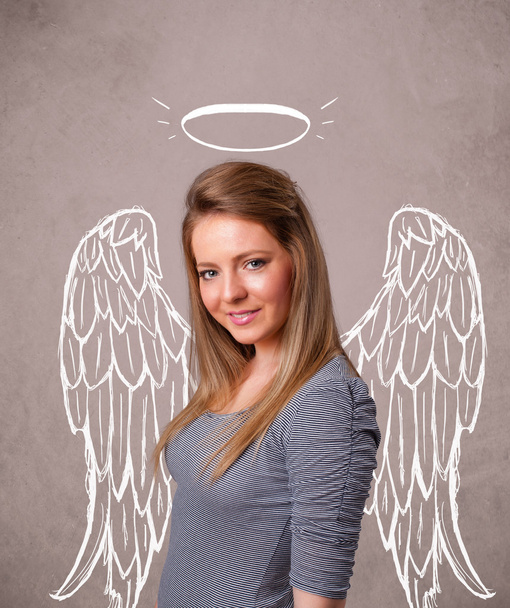 Cute girl with angel illustrated wings - 写真・画像