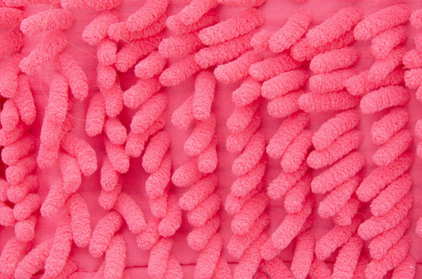 ピンクのビッグマイクロファイバー生地タオルのトップビューテクスチャ - 写真・画像