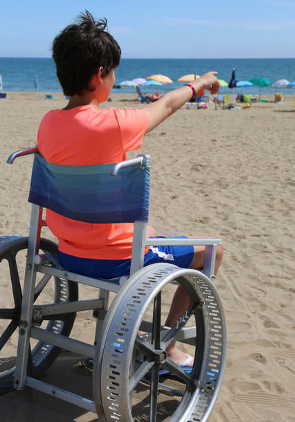 wheelchair with a young boy - Photo, Image