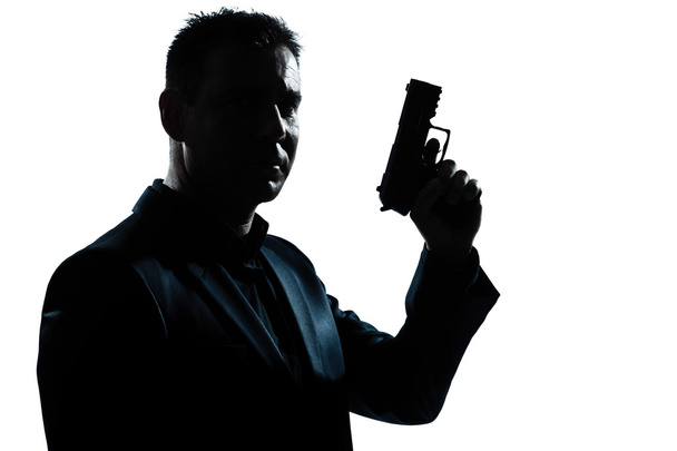 silhouette man portrait with gun - Photo, image