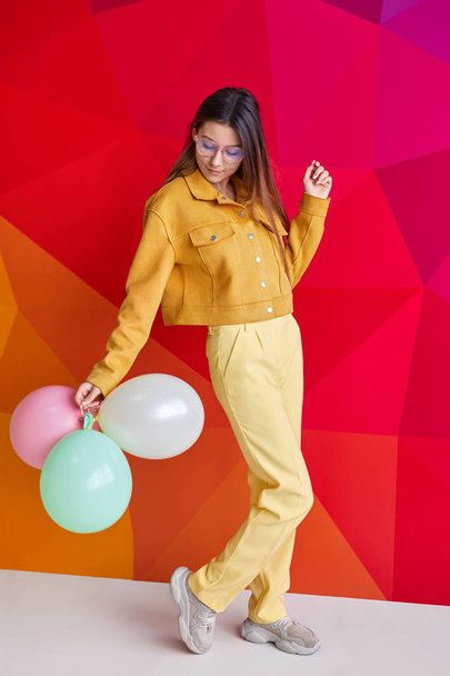 Young woman dancing with balloons - Foto, Imagem