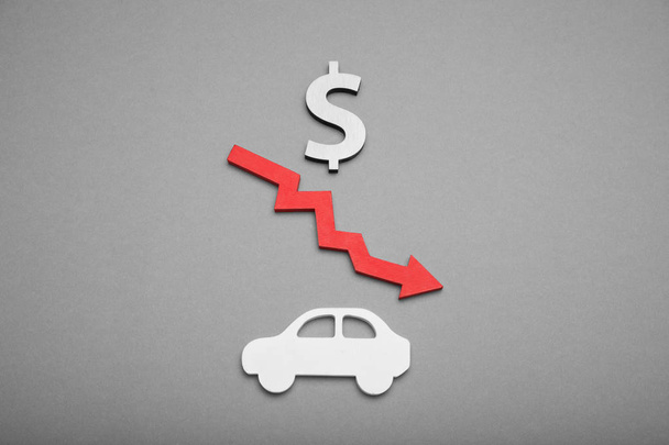 Decline car price concept, down change value cost. - Фото, изображение