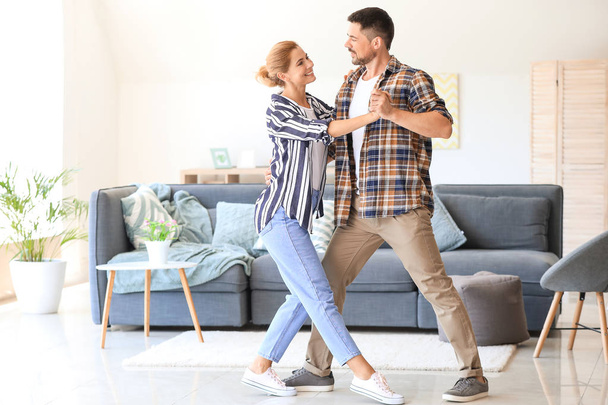 Happy dancing couple at home - Photo, Image