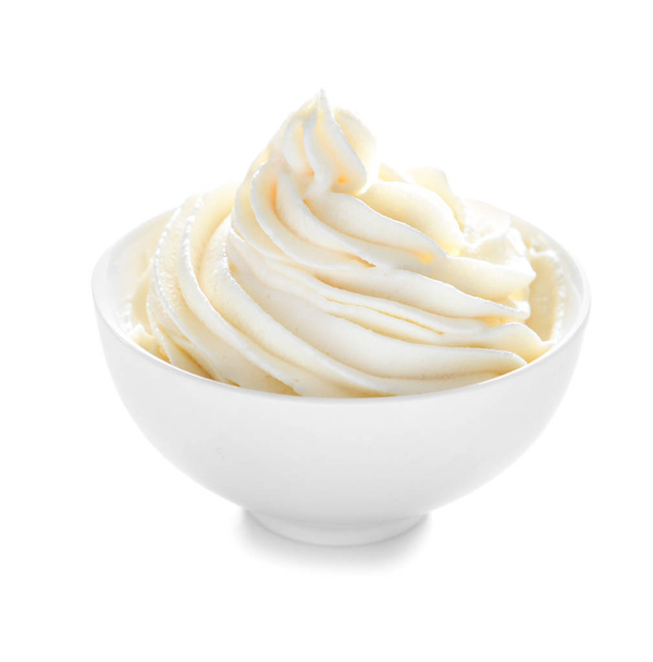 Whipped cream in bowl on white background - Photo, Image
