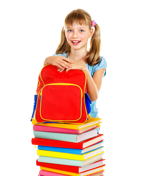 School child holding book. - Fotó, kép