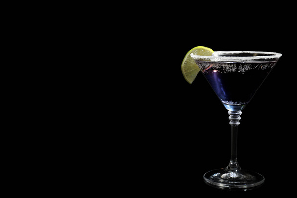Glass of delicious cocktail on black background. Space for text - Foto, afbeelding
