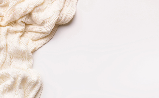 White autumn warm scarf on white background with copy space - Zdjęcie, obraz