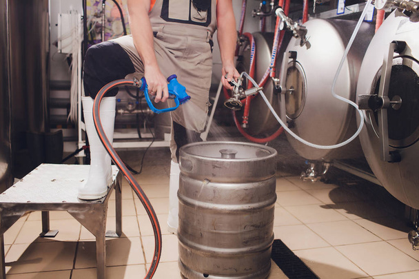Craft beer brewing equipment in brewery Metal tanks, alcoholic drink production. - Φωτογραφία, εικόνα