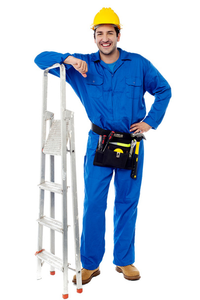 Construction worker with step ladder - Foto, Bild