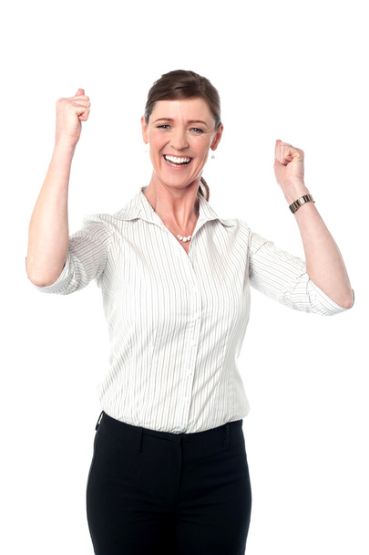Excited corporate lady with clenched fists - Foto, immagini