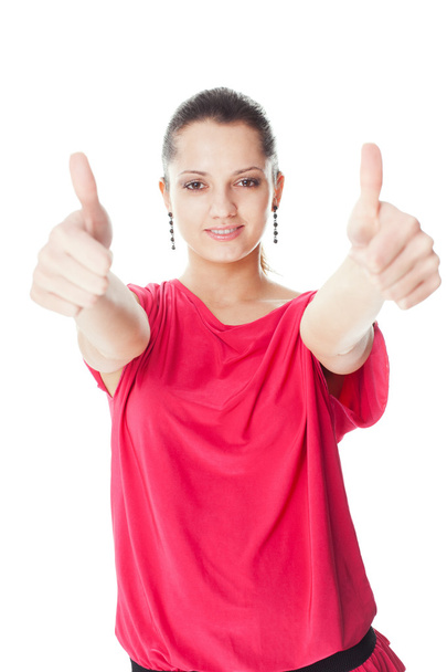 Young woman showing thumbs up - Фото, зображення