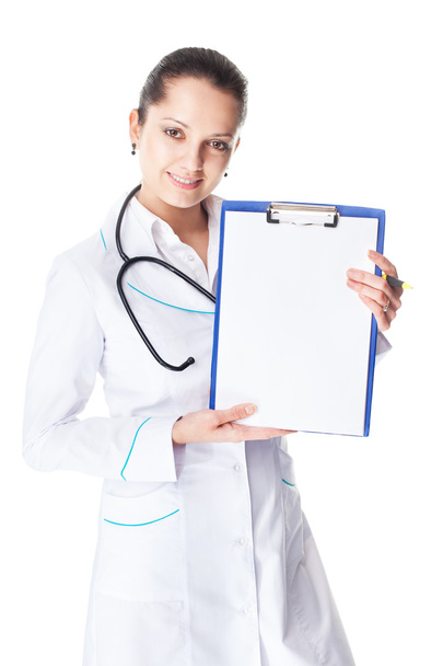 Female doctor showing blank clipboard - Фото, изображение