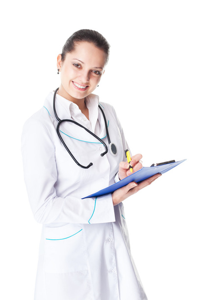young smiling female doctor with clipboard - Φωτογραφία, εικόνα