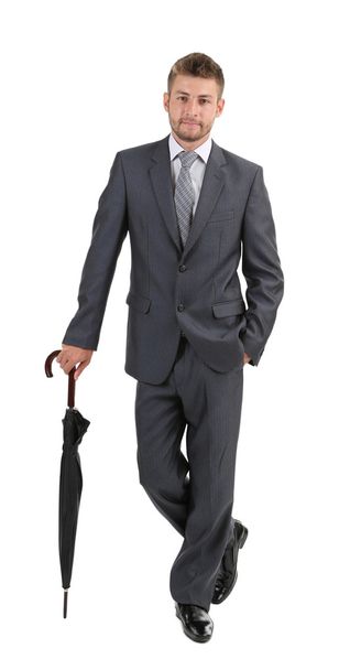 Businessman with umbrella, isolated on white - Photo, image