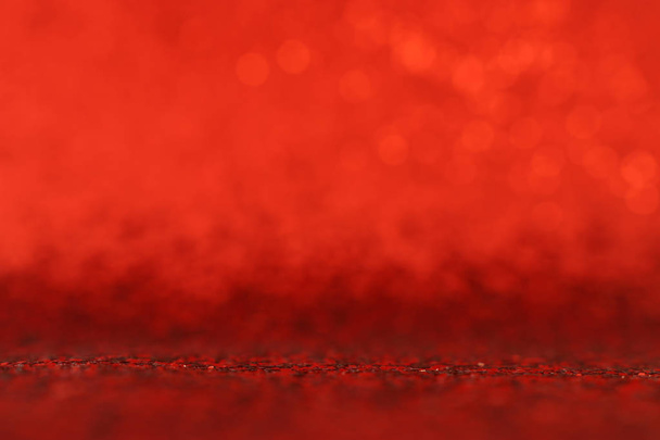 pozadí abstraktních červených třpytových světel. rozostření - Fotografie, Obrázek