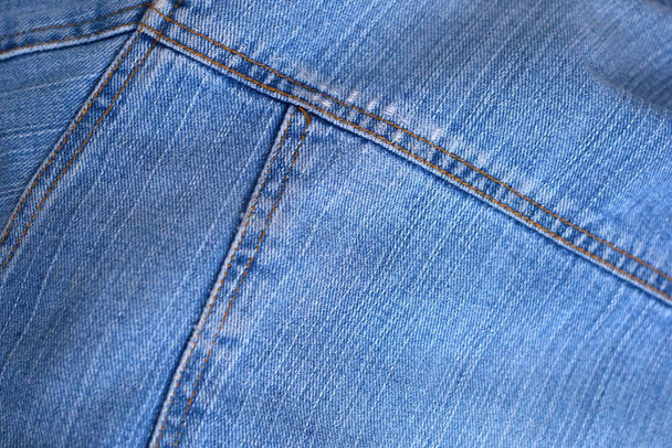 blau getragene Jeans Textur Detail Nahaufnahme. - Foto, Bild