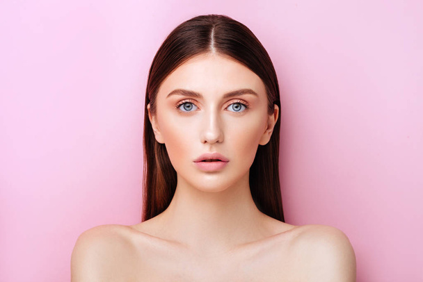 Beauty model with natural make up on pink background - 写真・画像