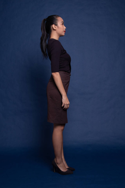 Full body side view of beautiful young asian woman. - Fotó, kép