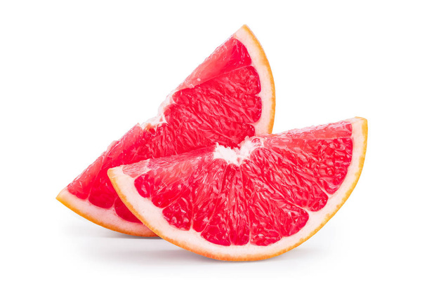 Grapefruitové řezy izolovaných na bílém pozadí closeup - Fotografie, Obrázek