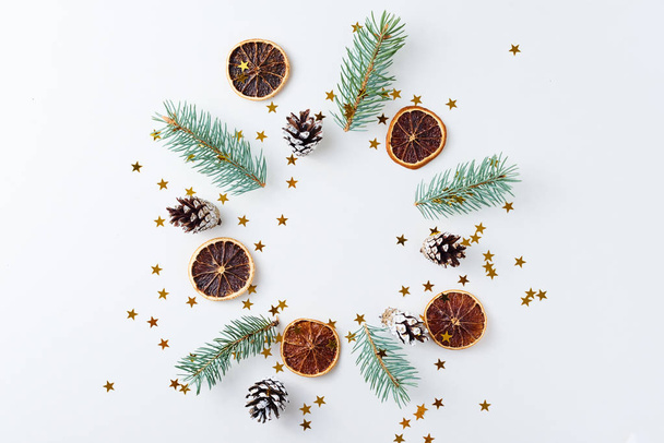 Christmas background made of pine cones and fir tree - Photo, Image