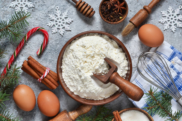 Ingredients for Christmas baking: flour, eggs, sugar, nuts - Foto, imagen