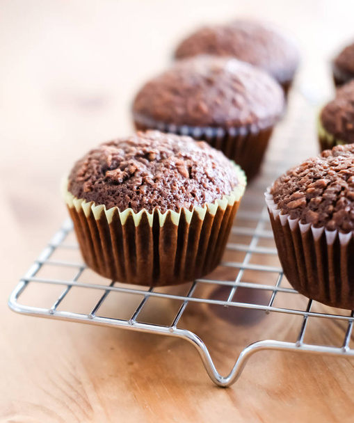 Chocolate cupcakes background.  - Photo, Image