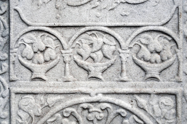 Tomb stones were remain from Ottoman era.Each made by marble.Engraved flower and fruits motifs can seen on the most of them. - Fotoğraf, Görsel