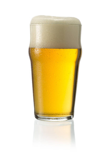 Glass of blonde beer with foam - 写真・画像