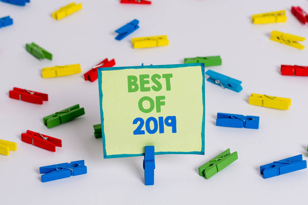 Conceptual hand writing showing Best Of 2019. Business photo showcasing great and marvelous things and events happened on 2019 Colored clothespin papers empty reminder white floor office. - Photo, Image