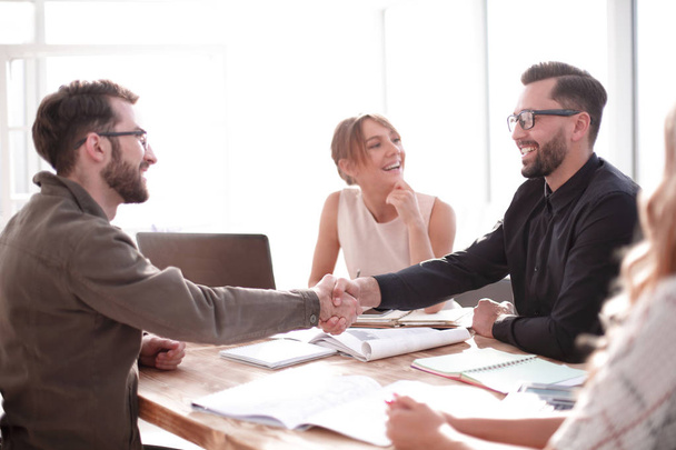 handshake business people at a meeting in the office - Fotó, kép