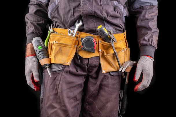 Production worker with tool belt. - Photo, Image