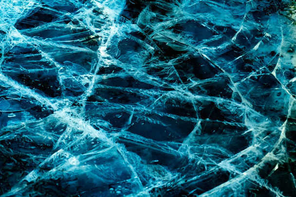 hielo agrietado azul y negro
 - Foto, Imagen