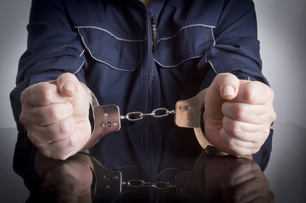 Prisoner with handcuffs on hands - Fotoğraf, Görsel
