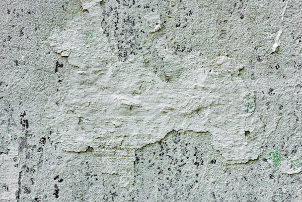 クラックや傷のあるコンクリート壁の質感が背景として使用できます - 写真・画像