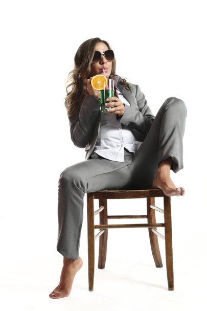 Woman relaxing with a drink - Photo, Image