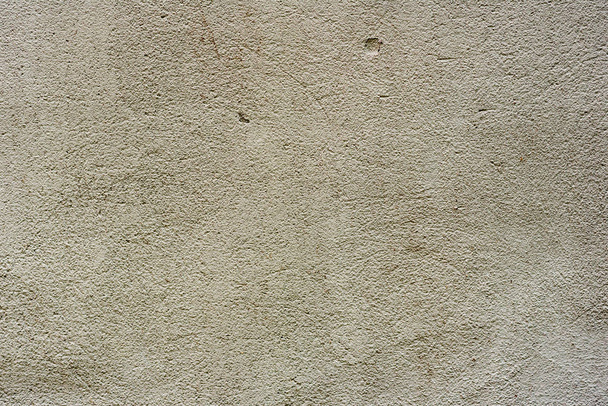 textura de uma parede de concreto com fendas e arranhões que podem usar-se como um contexto - Foto, Imagem