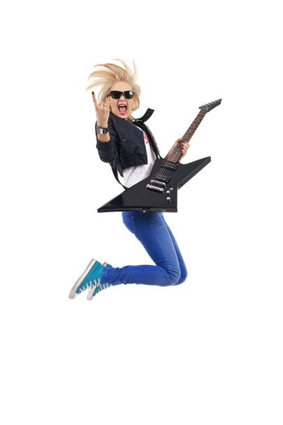 Woman guitarist jumps - Photo, Image