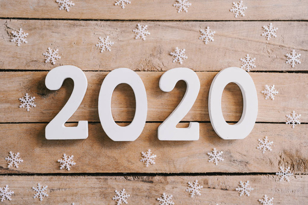 2020 New year concept on wood table and christmas decoration bac - Фото, зображення