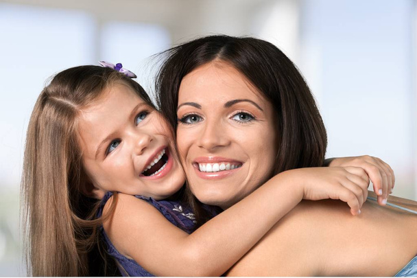 Happy Mother and daughter hugging  - Photo, image
