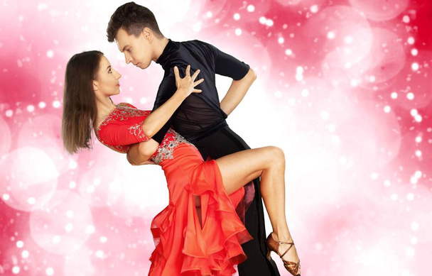 young man and a woman dancing Salsa - Фото, изображение