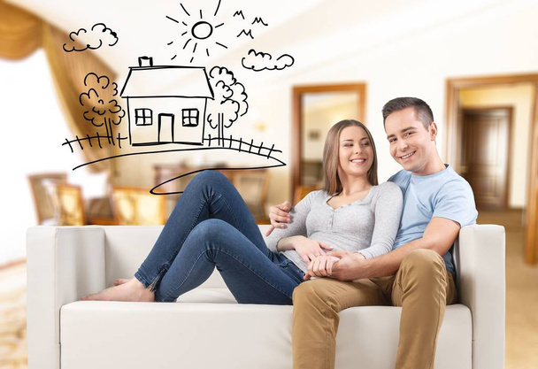 happy young man and woman dreaming of new house  - Photo, image