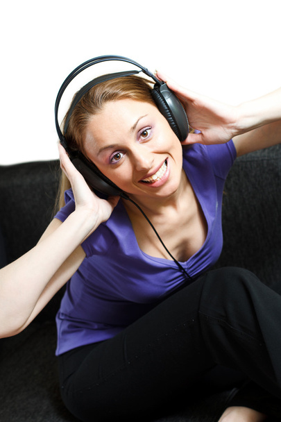 Beautiful girl listening music - Foto, imagen