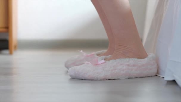 Woman wear slipper at home. - Záběry, video