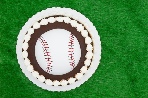 Blank baseball cake on a green fake grass - Photo, Image