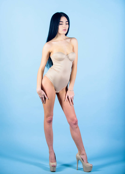 Lady in bodysuit young and healthy. Wellness and spa. Girl with smooth skin. Wellness beauty care procedure. Massage and beauty manipulation. Cosmetology concept. Pure and simple. Beauty procedure - 写真・画像