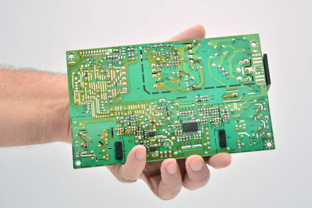 hand holding an electronic circuit board - Photo, Image