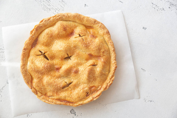 Apple pie on the parchment - Zdjęcie, obraz