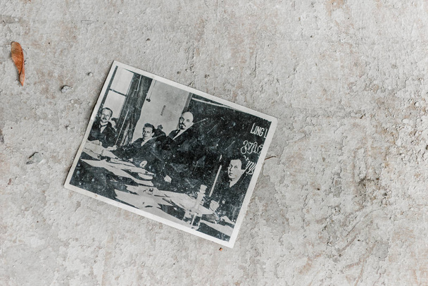 PRIPYAT, UKRAINE - AUGUST 15, 2019: top view of black and white photo with businessmen  - Foto, Imagen