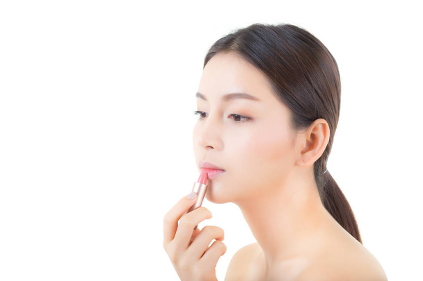 Lipstick makeup asian woman with lip balm care. Beauty Asian gir - Photo, Image